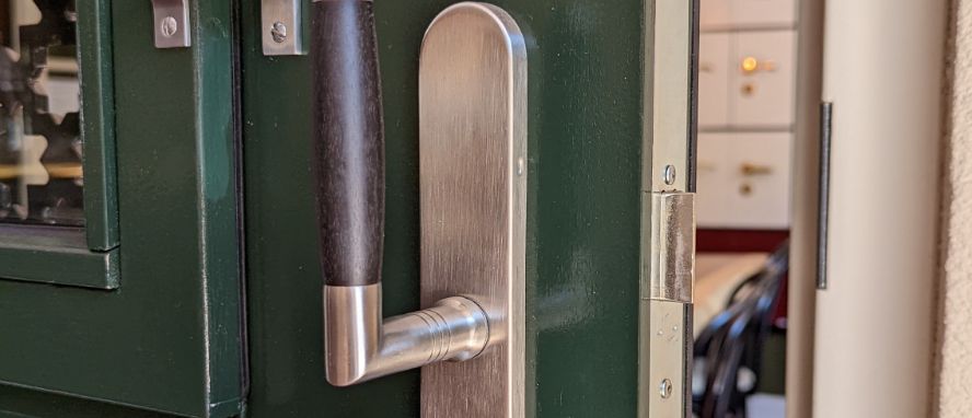 Sfeerafbeelding deurklink omhoog
